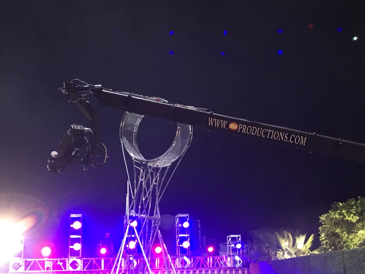 Full-length RA Productions camera crane working above a live venue