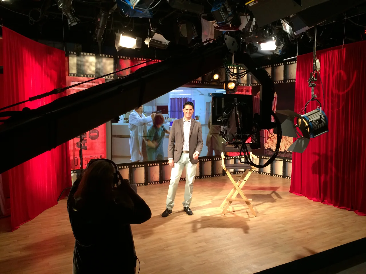 Camera crane working across a live broadcast stage